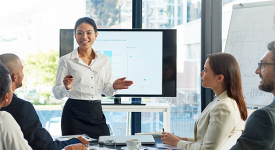 Native Ad Image_Corporate Woman Presenting_600x600 Native Ad Image_Corporate Woman Presenting_600x600