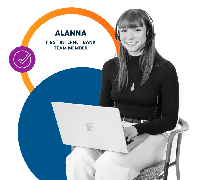 banker sitting with laptop looking at personal cd rates